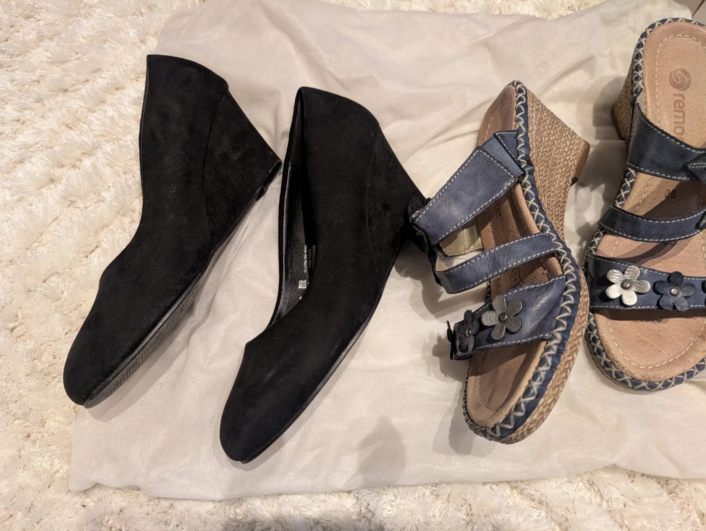 Black wedge heels and Remonte blue sandals
