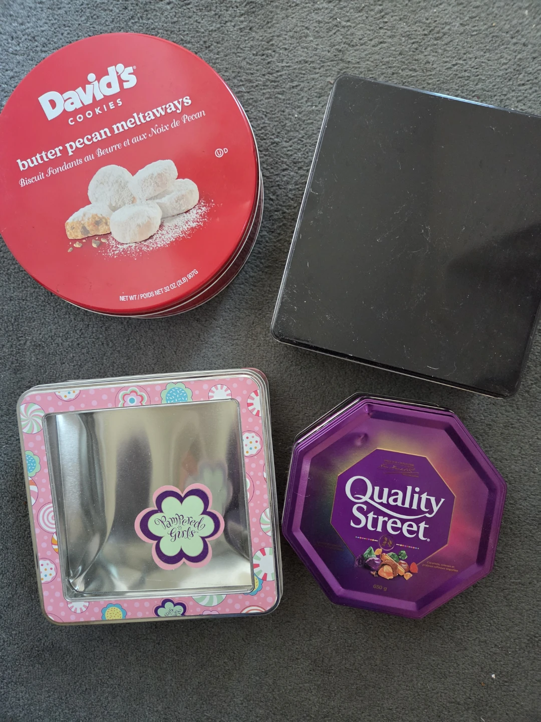 Assorted metal tins