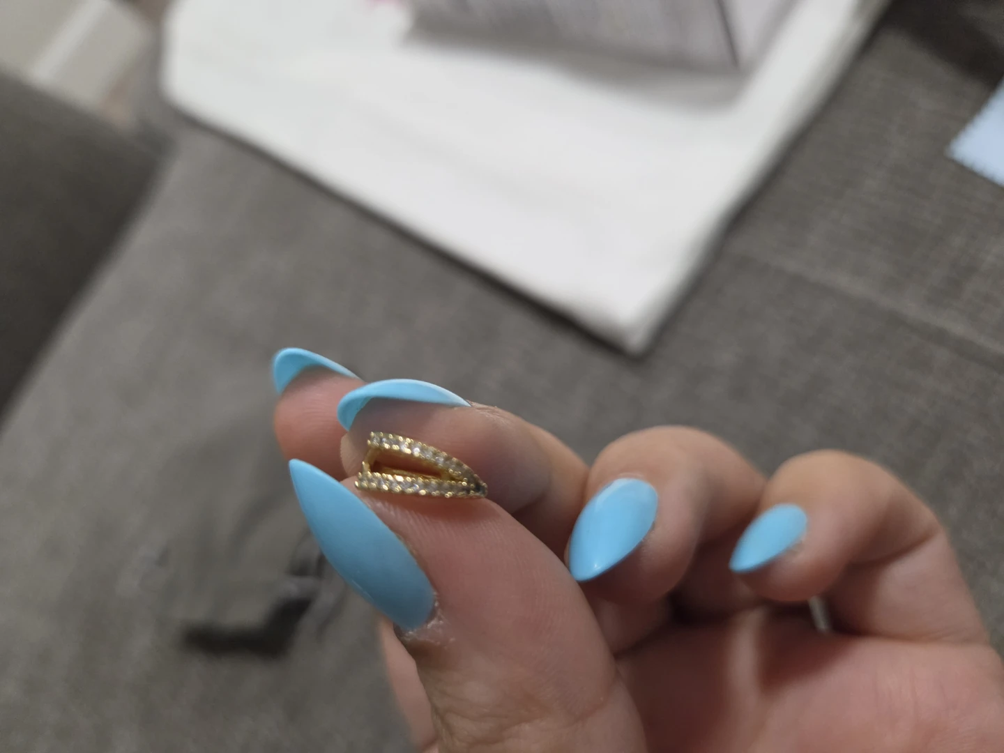 Gold-tone ear cuff with rhinestones