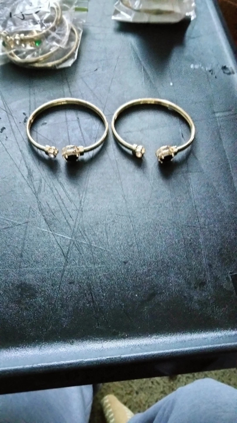 2 Gold Tone Bracelets with Clear and Dark Stones