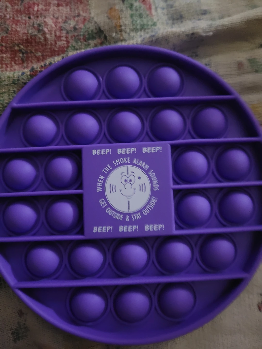 Purple fidget pop it toy