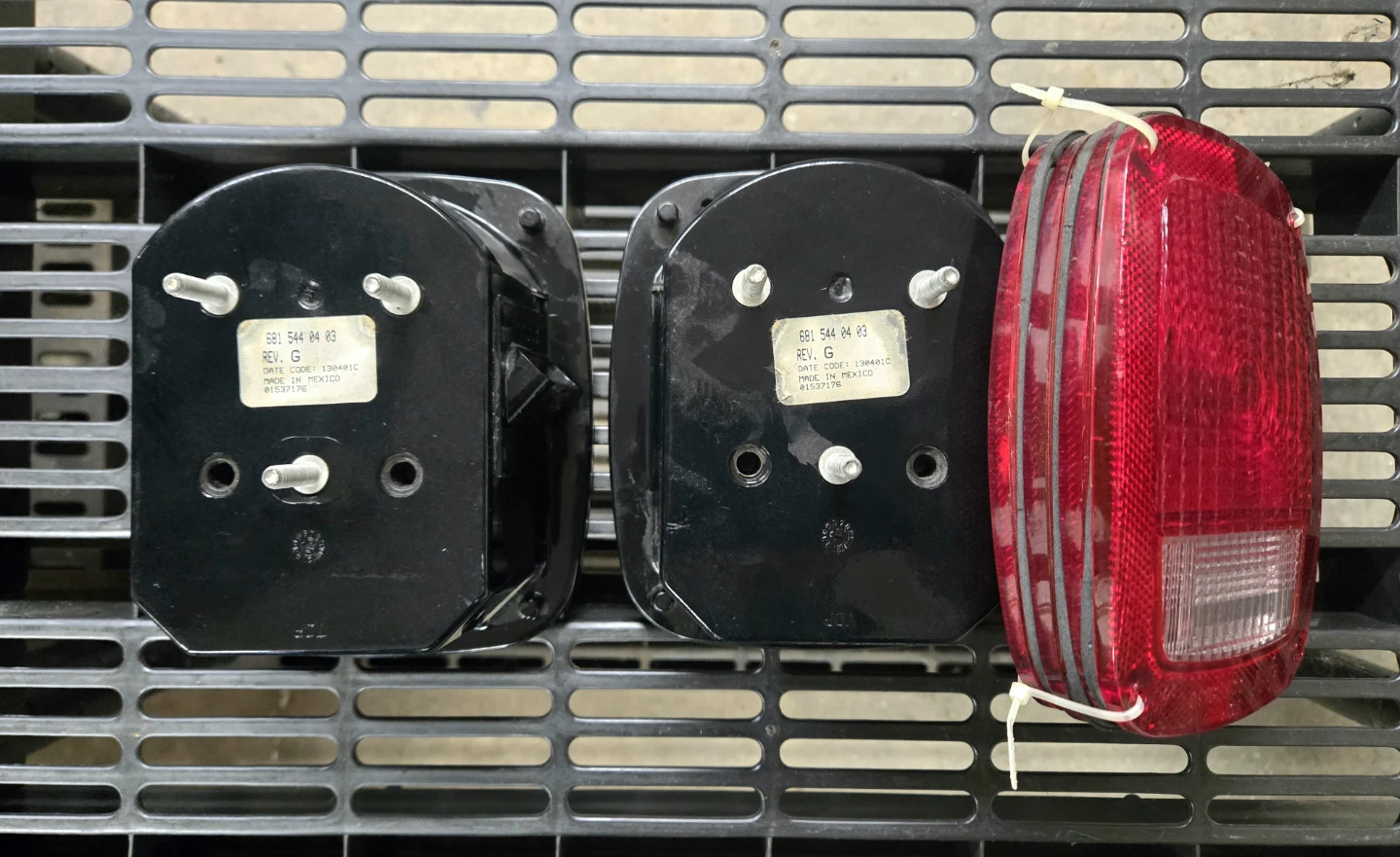 Jeep Wrangler TJ OEM Tail Light Assemblies + Extra Lenses