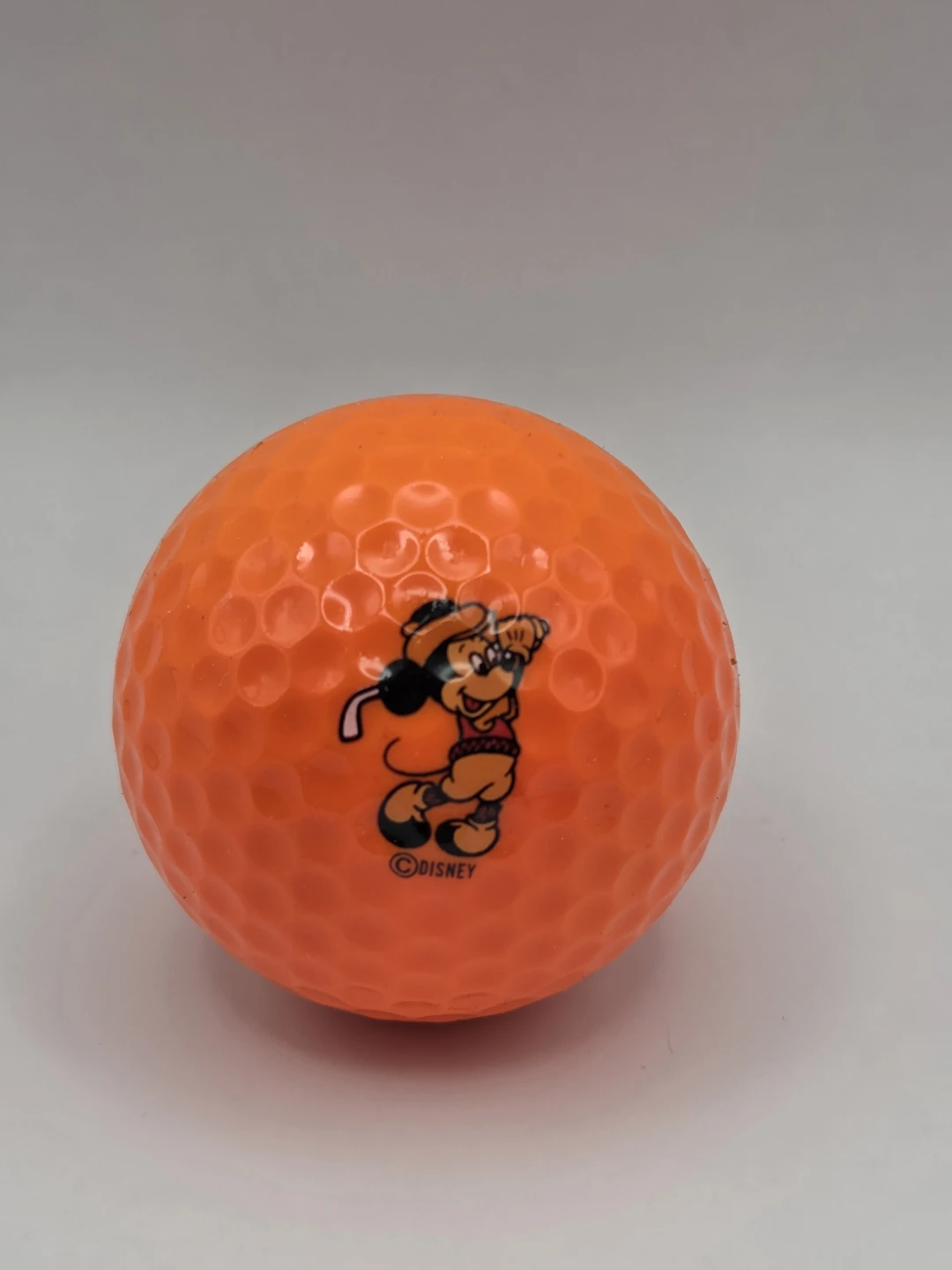 Acushnet Orange Golf Ball with Mickey Mouse Design - Number 2