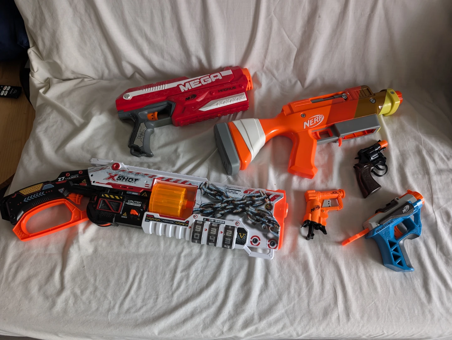 4x Nerf Toy Blasters + 1x X shot + Revolver