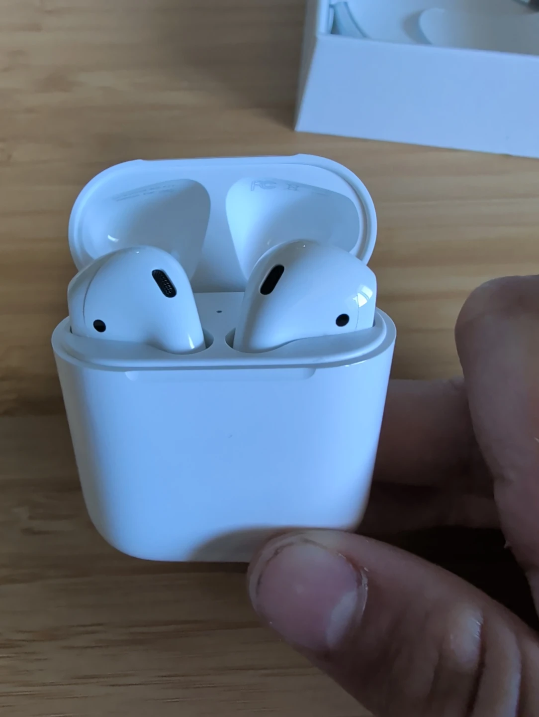 Apple AirPods with Charging Case - photo 2