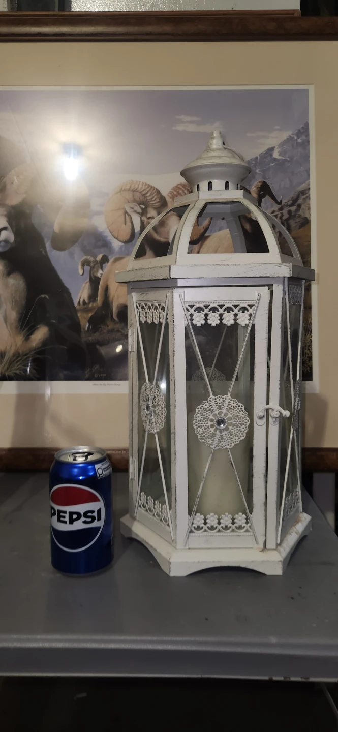 White decorative lantern with candle