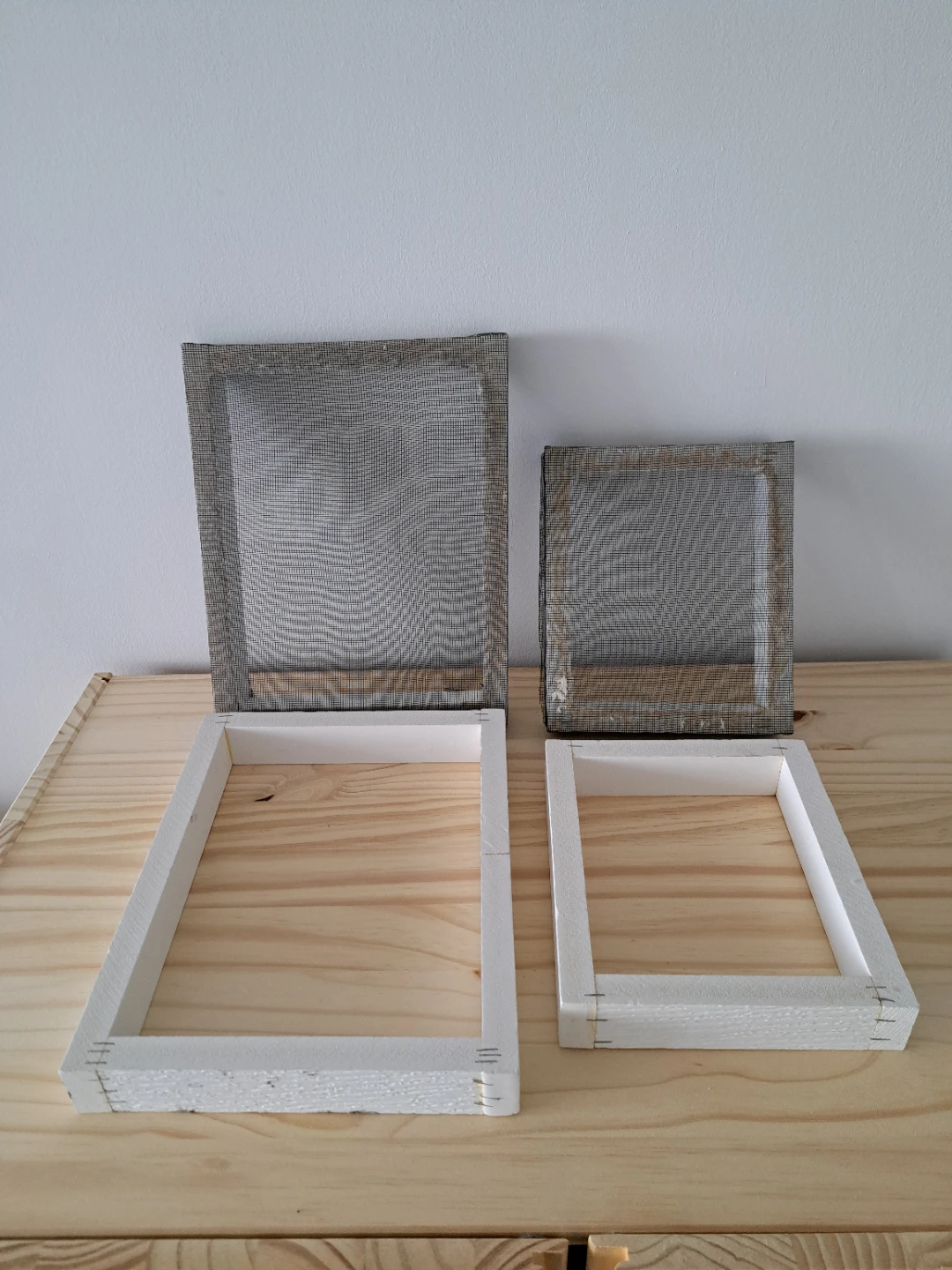 Two handmade frames for making handmade paper and recycled paper