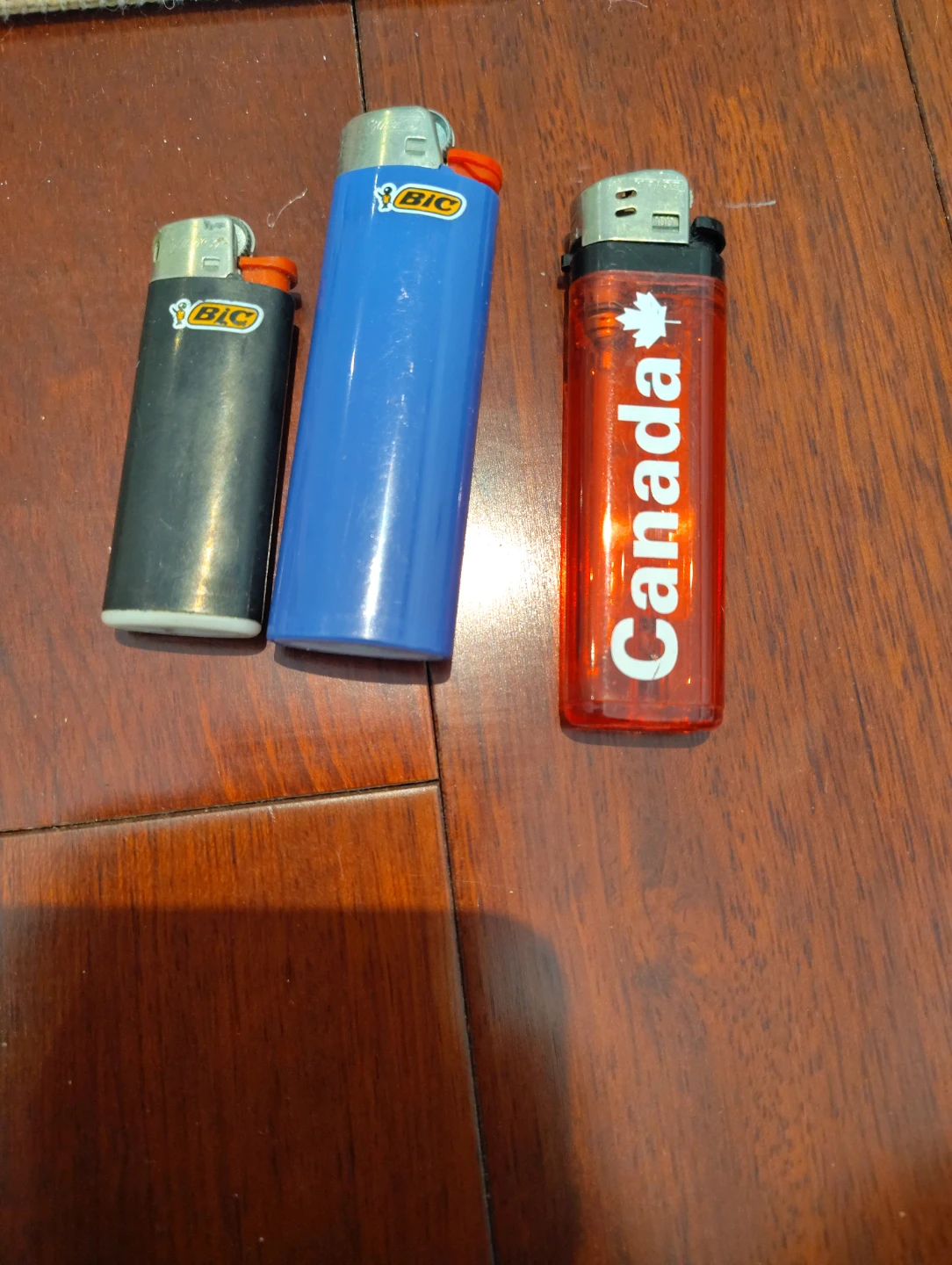 3 Bic Lighters - Blue, Black, and Canada Themed