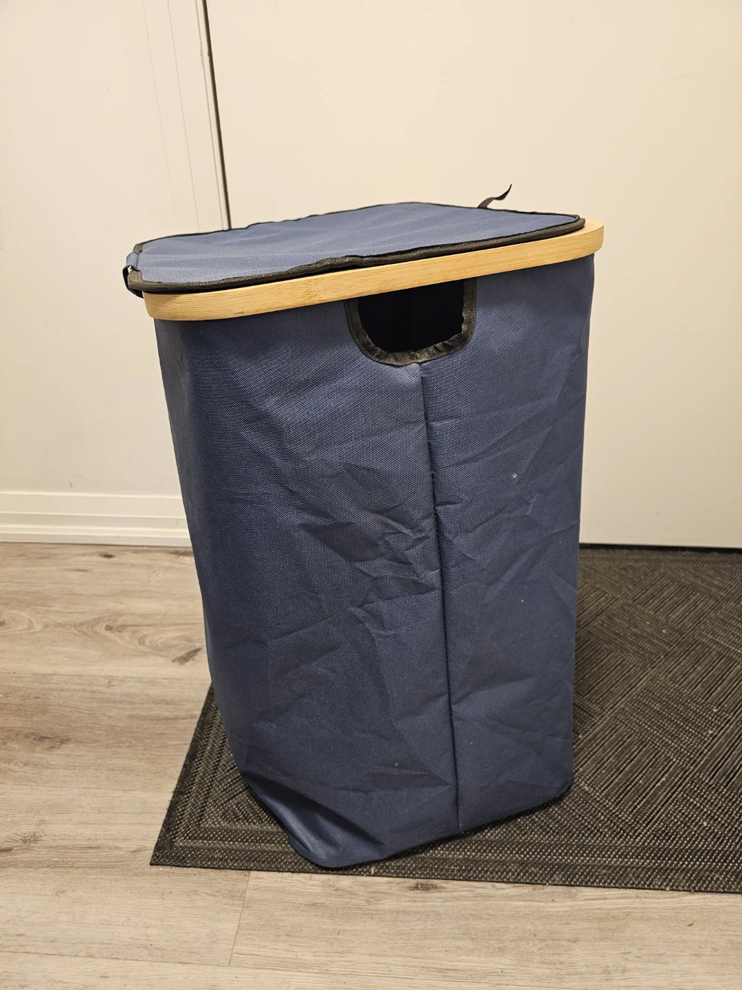 Blue fabric laundry hamper with wooden rim - photo 3