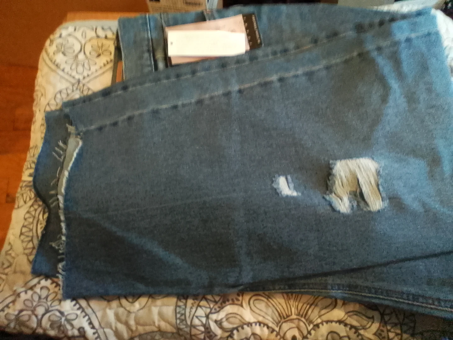 Distressed Blue Denim Jeans