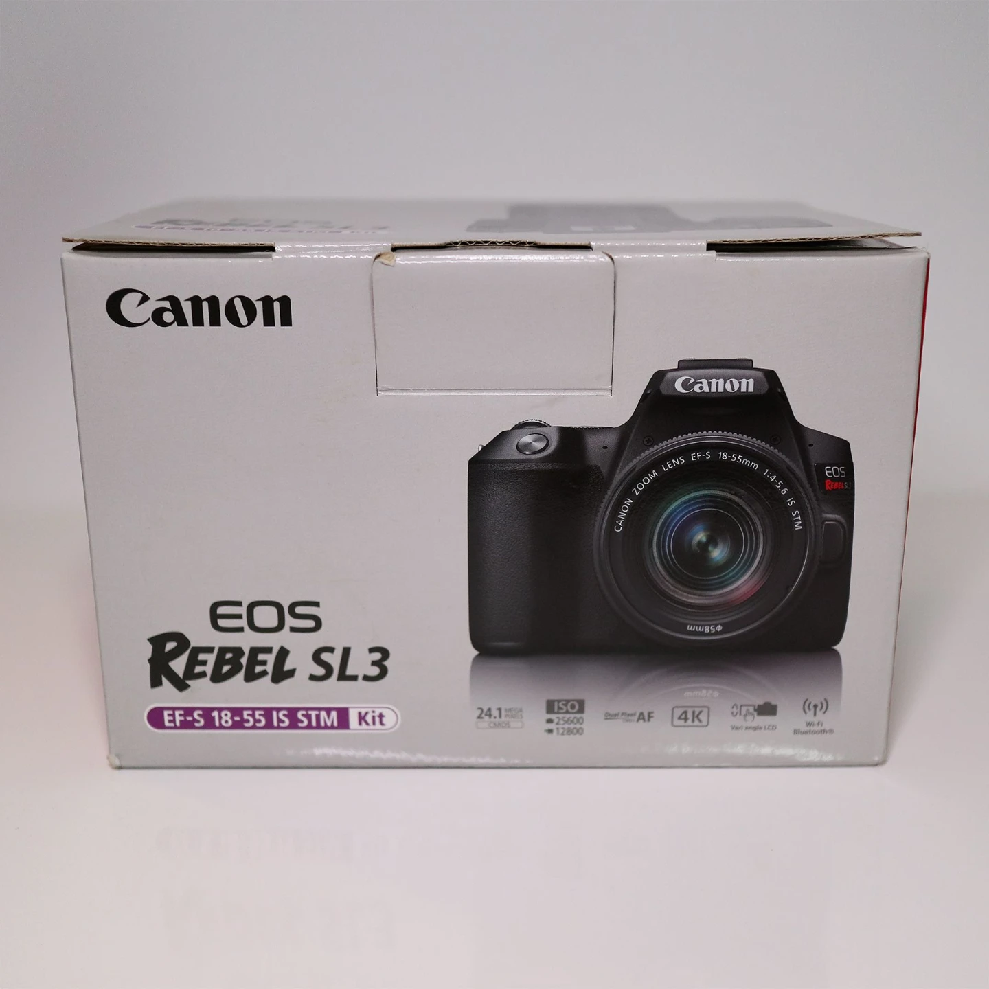 Canon SL3 w/ EF-S 18-55mm F4-5.6 IS STM Lens