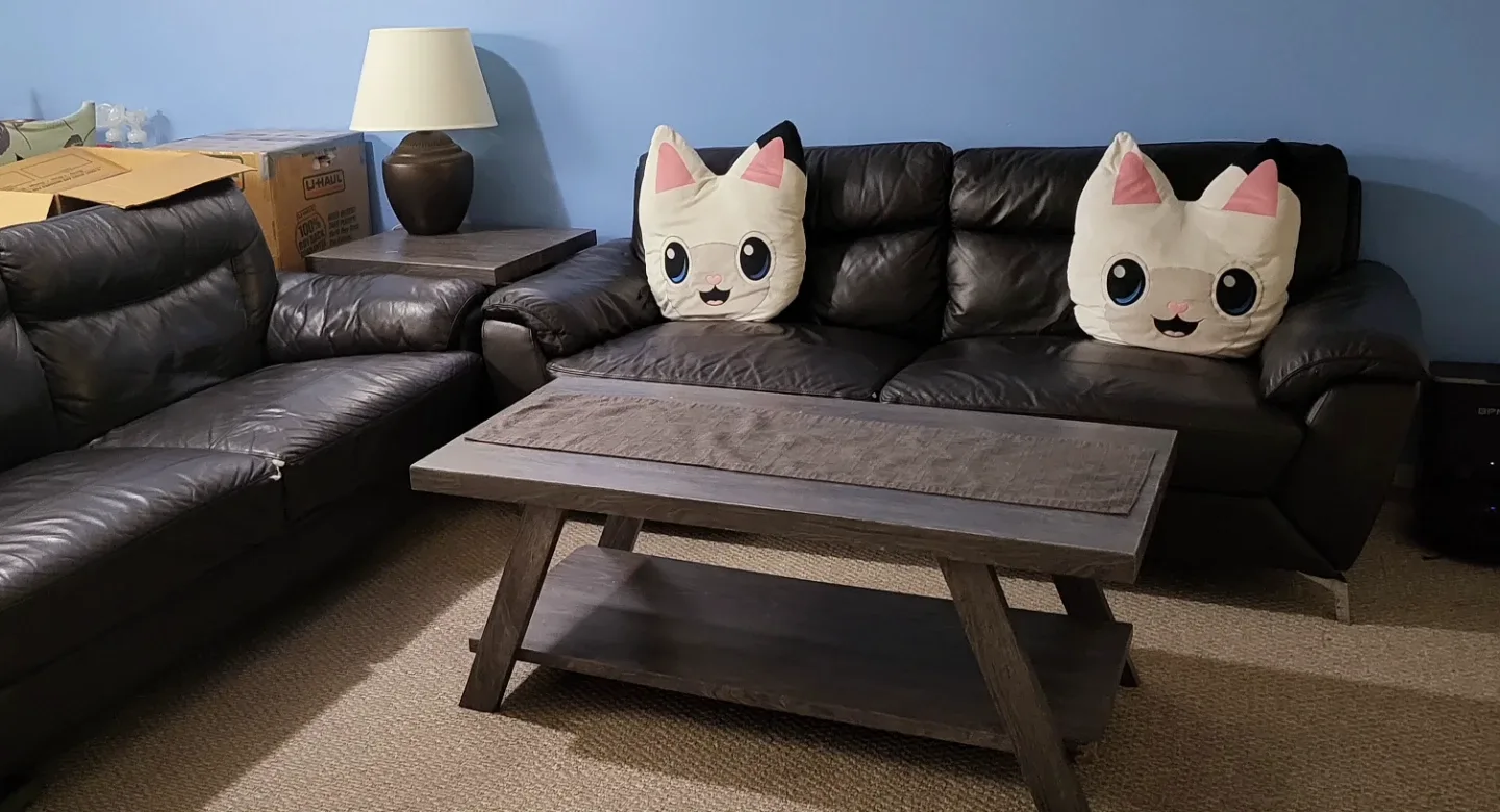 2 black sofa with tables and pillows - photo 2