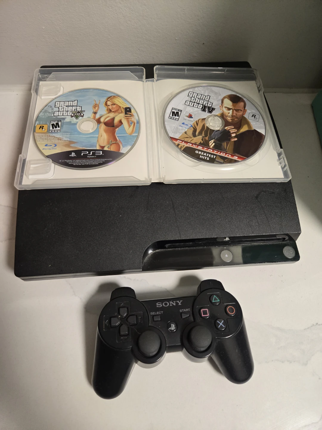 Sony PlayStation 3 with Grand Theft Auto IV & V