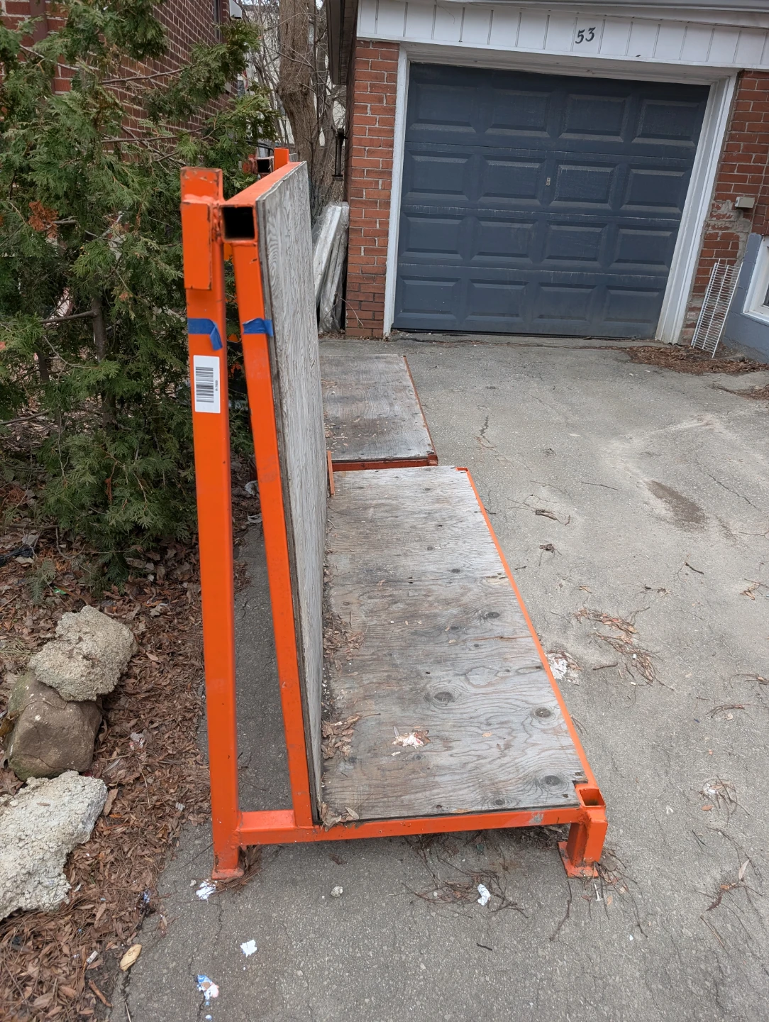 Orange Metal and Plywood Glass Racks