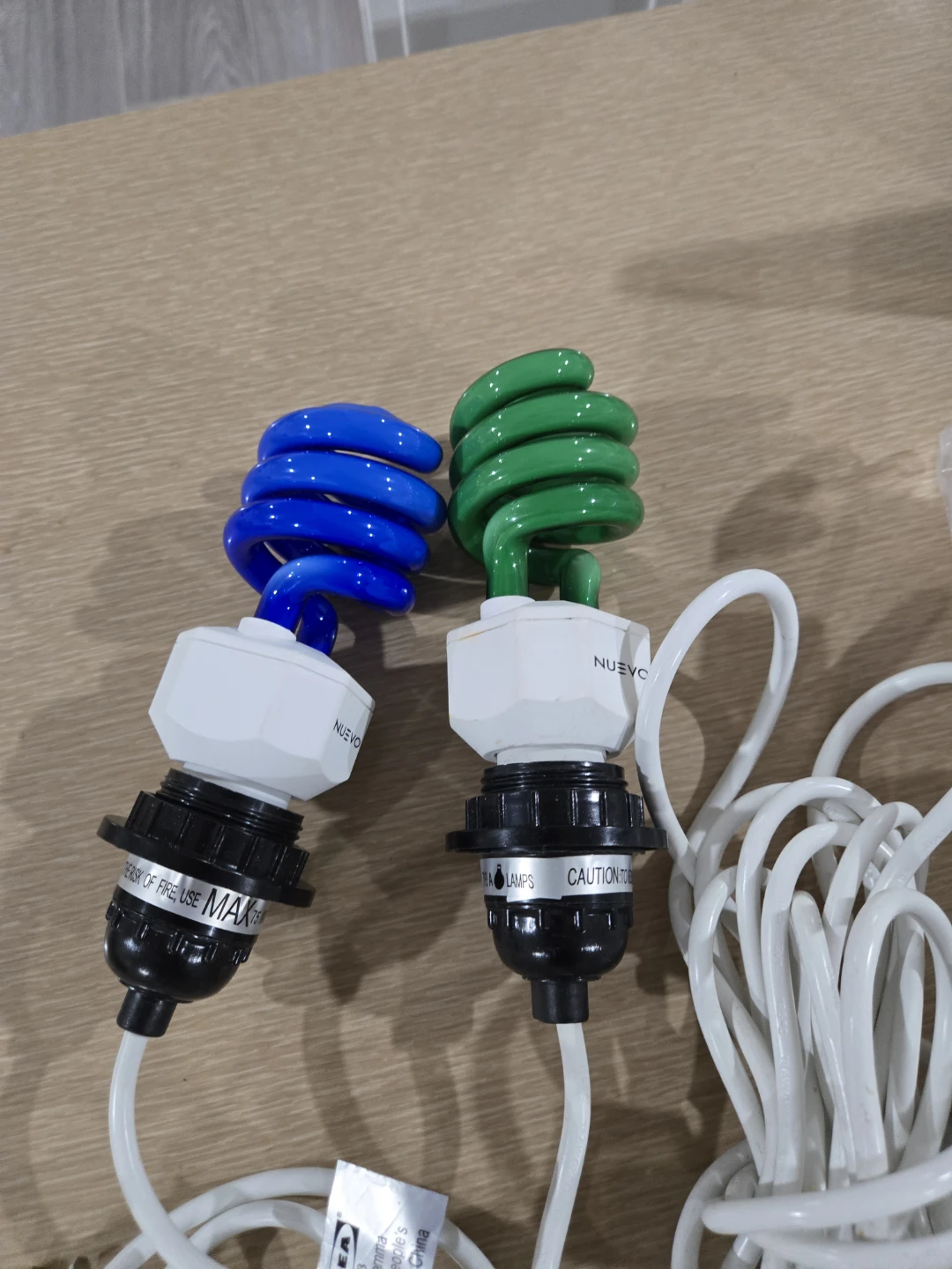 2 X Coloured Energy Saving Light Bulbs. Corded with socket.