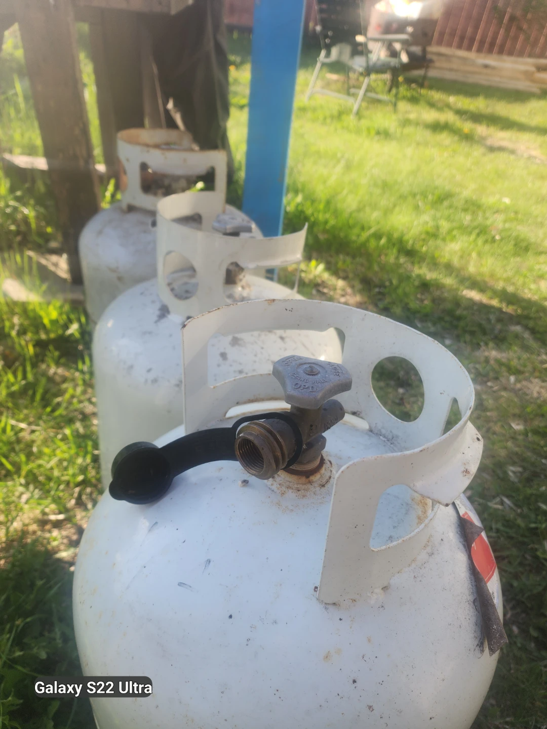 3  White Propane Tanks