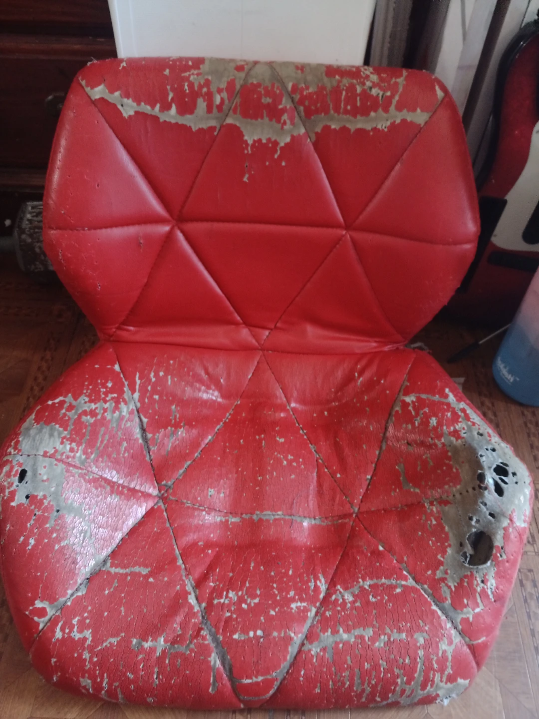 Red Vinyl Chair - Heavily Worn