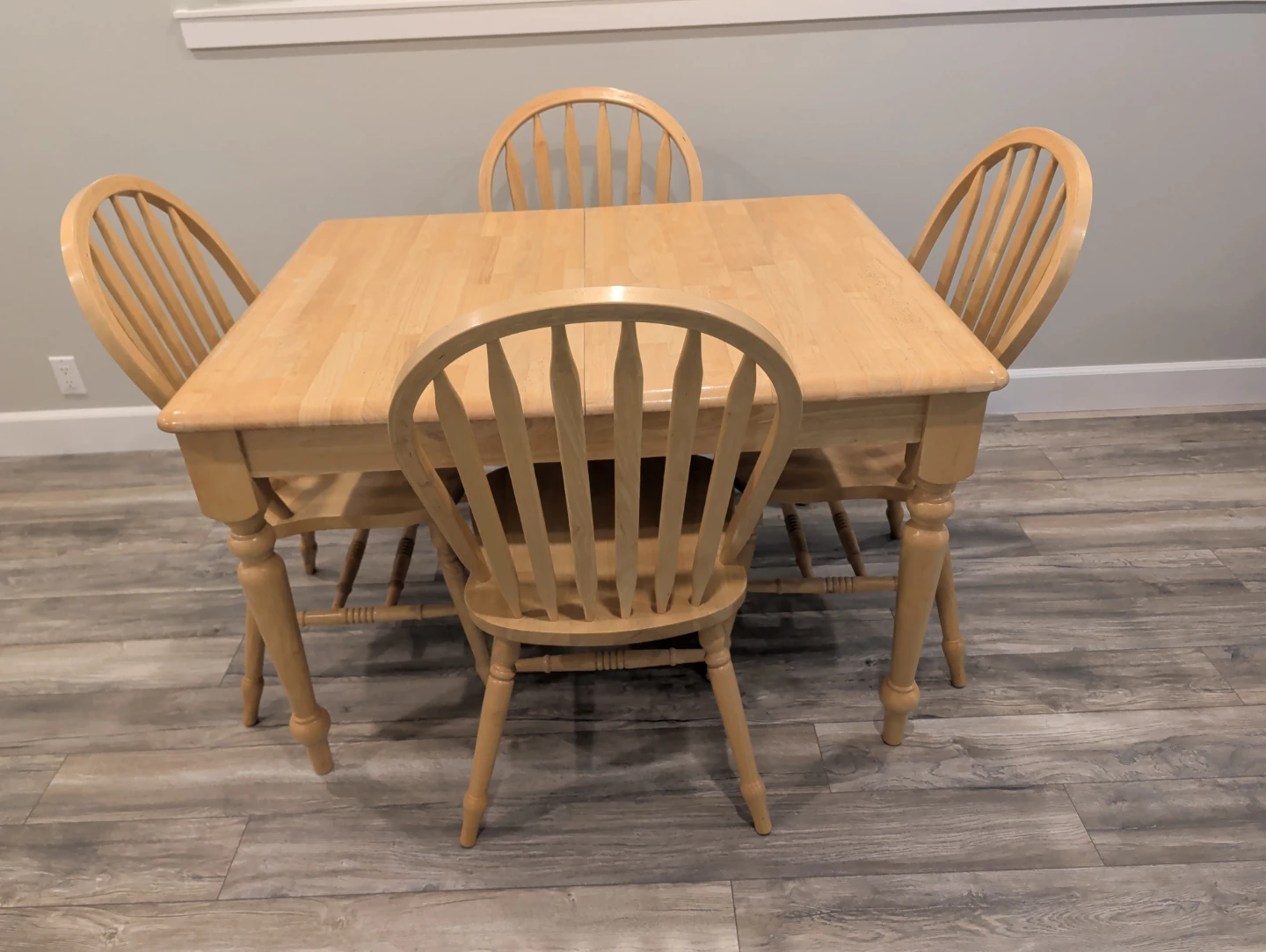 Solid hardwood butterfly leaf table and 4 chairs