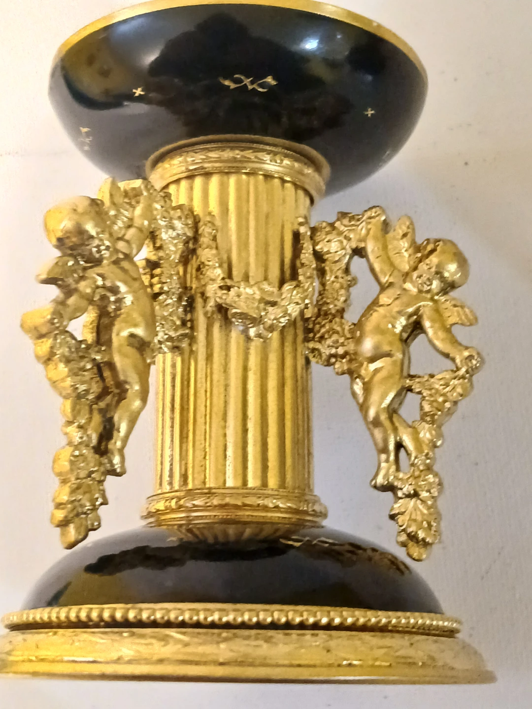 Ornate Gold and Black Cherub Candlestick Holder