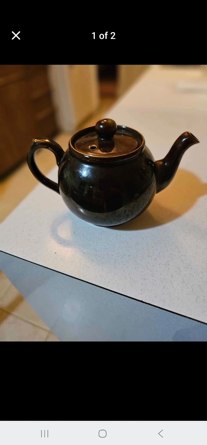 Nostalgic Brown Betty Teapot with hand knit tea cosy