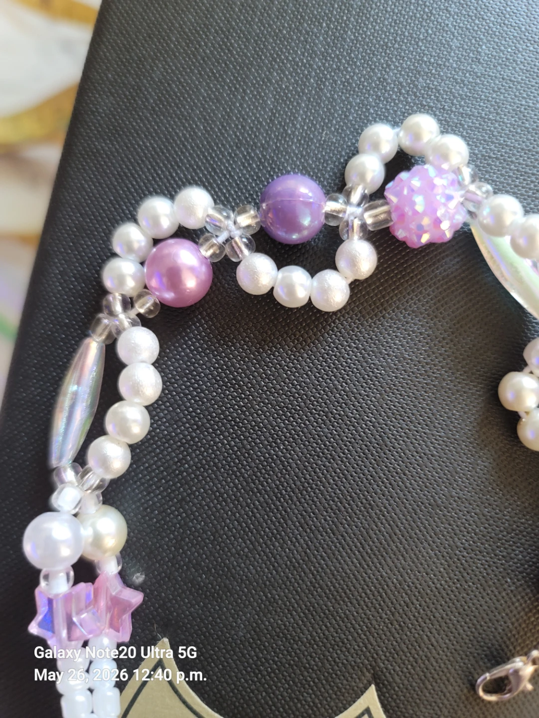 Handmade Bracelet with Pearls, Stars, and Purple Accents - photo 2
