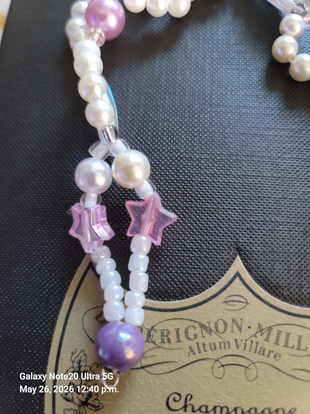 Handmade Bracelet with Pearls, Stars, and Purple Accents - photo 3