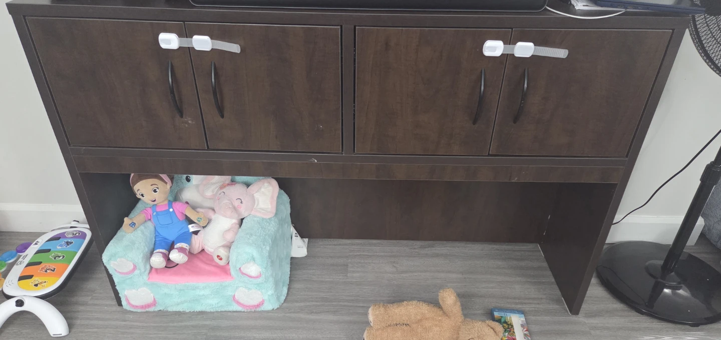 Tv cabinet with child safety lock
