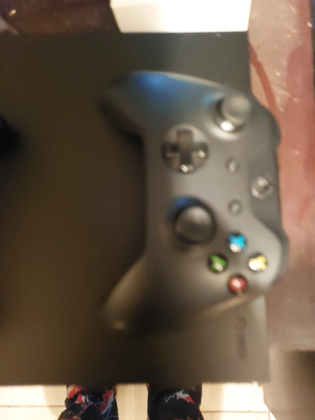 Two xbox controllers and  charging dock