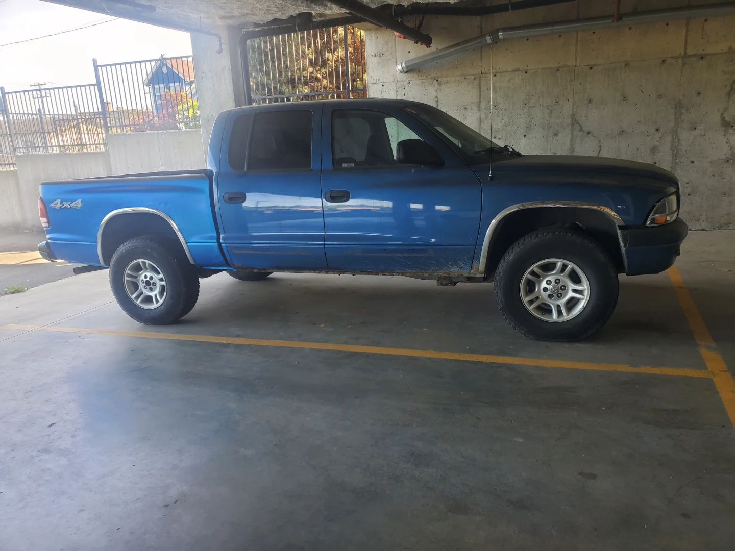 2004 Blue Dodge Dakota Quad Cab Pickup Truck