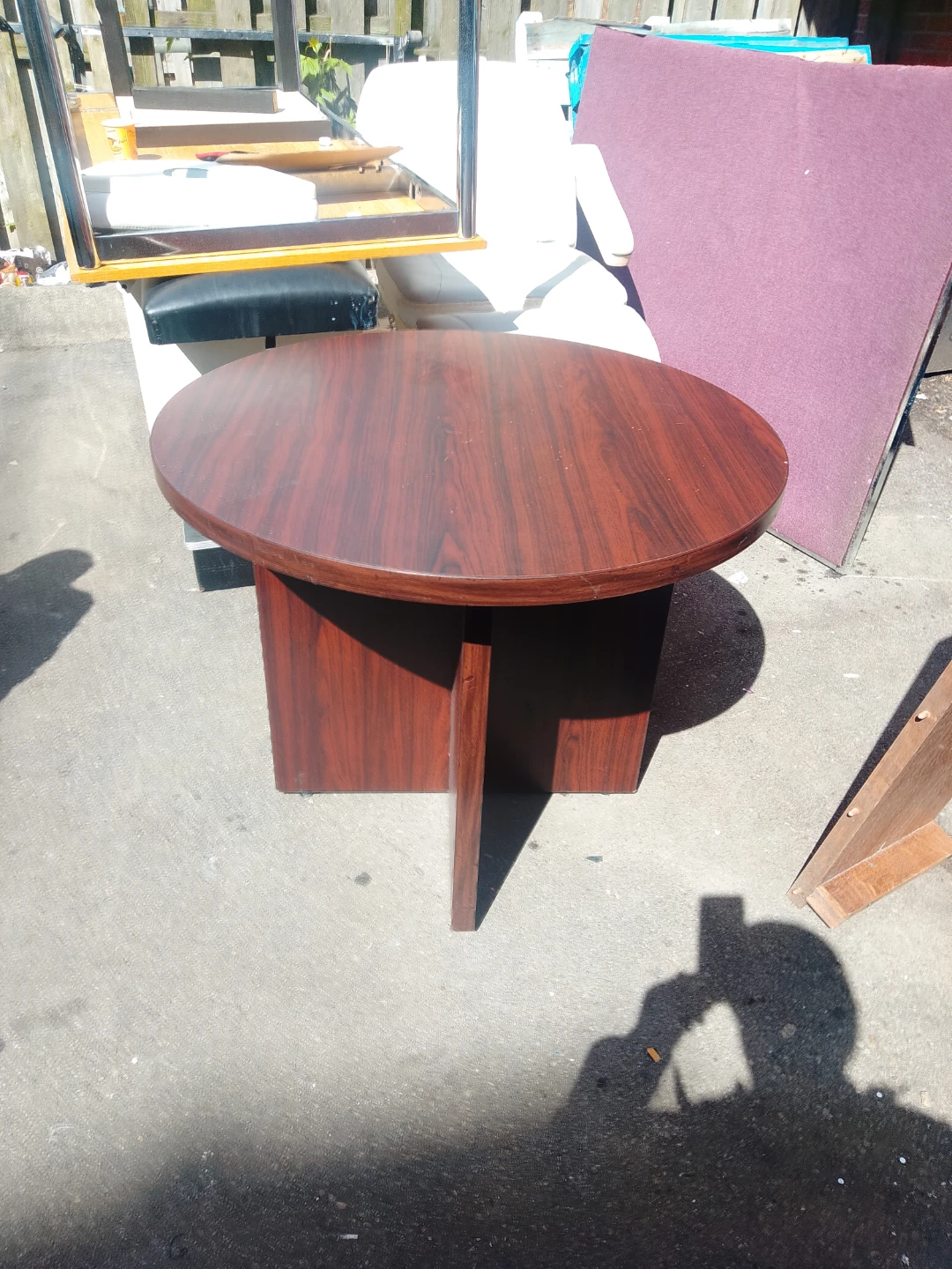 Round wood-look coffee table
