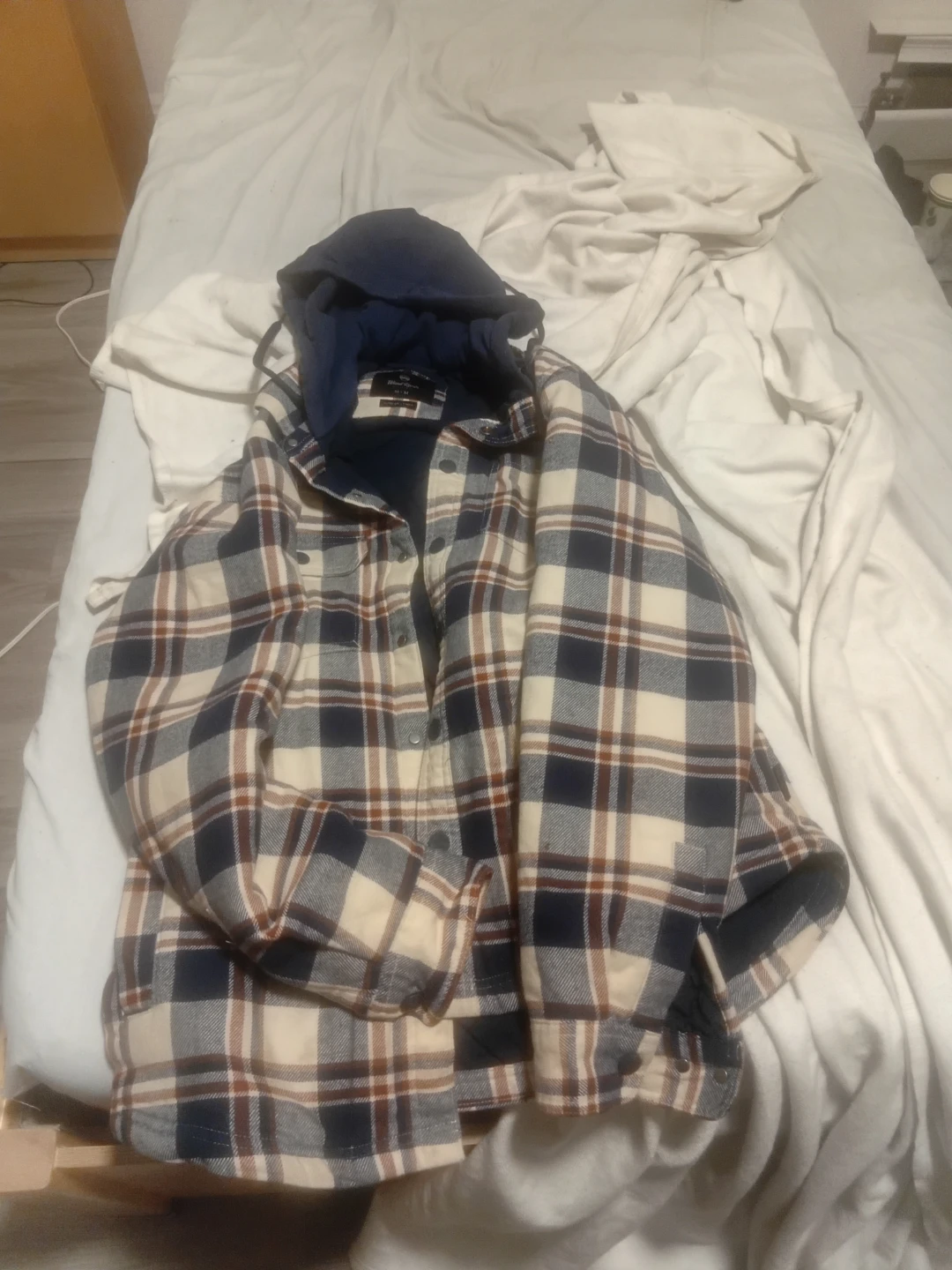 Chemise à carreaux avec capuchon
