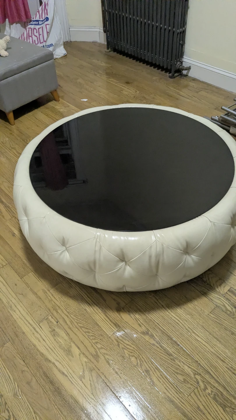 Tufted Round Ottoman Coffee Table with Black Glass Top