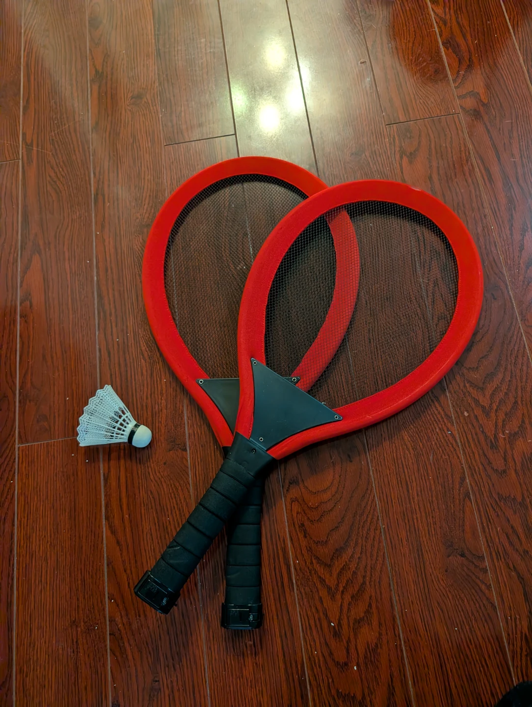 2 Red Badminton Rackets with Shuttlecock