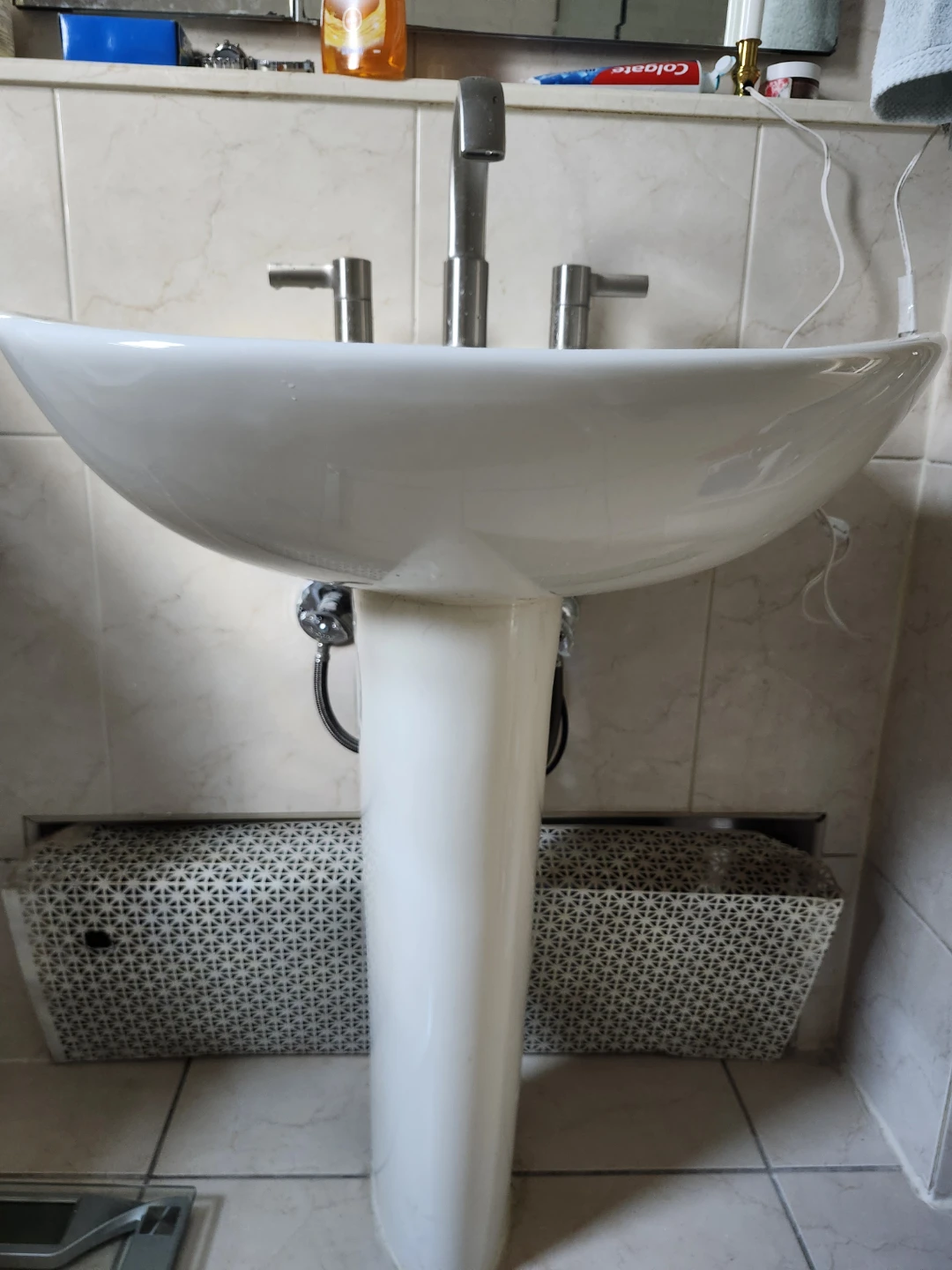 White Pedestal Sink with Faucet