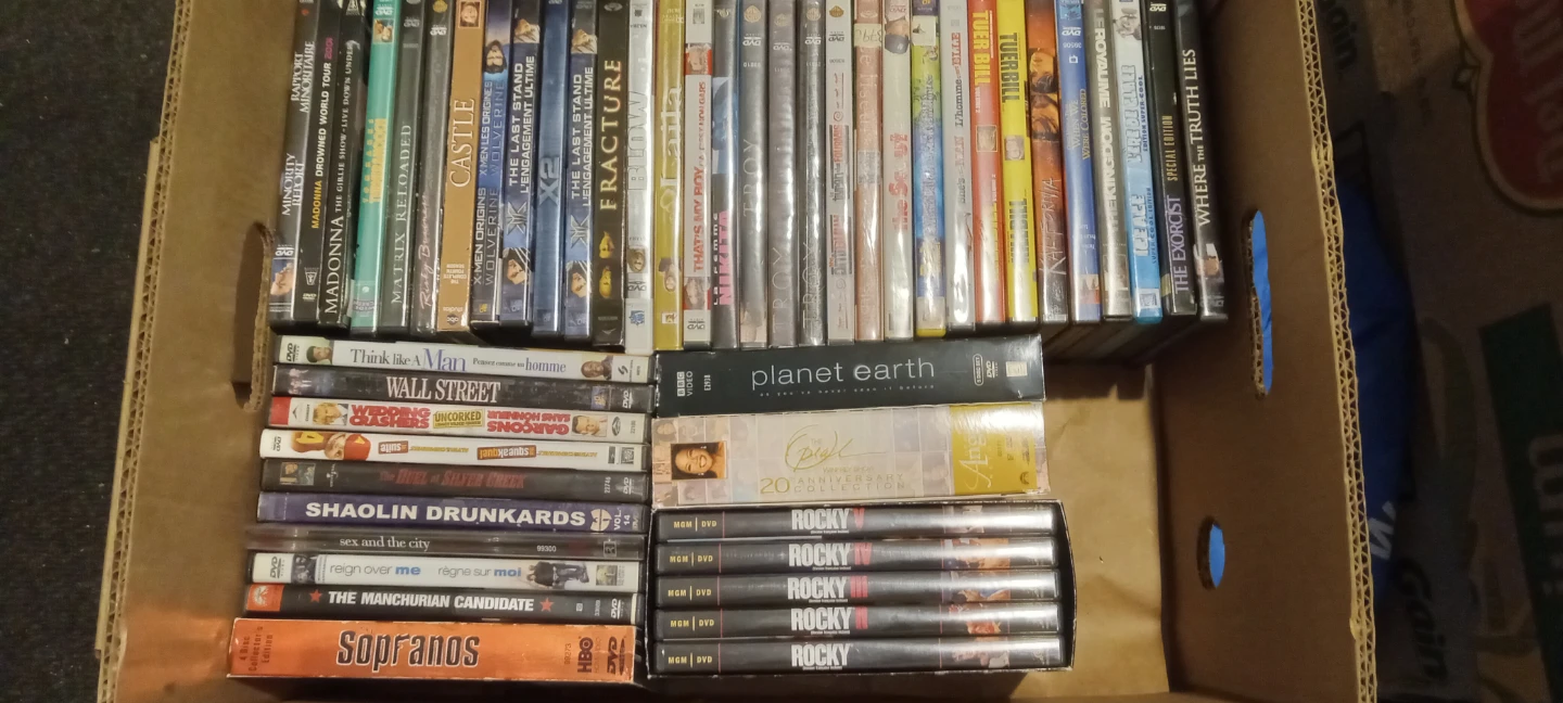 1 box of 52 Assorted DVD Movies Collection