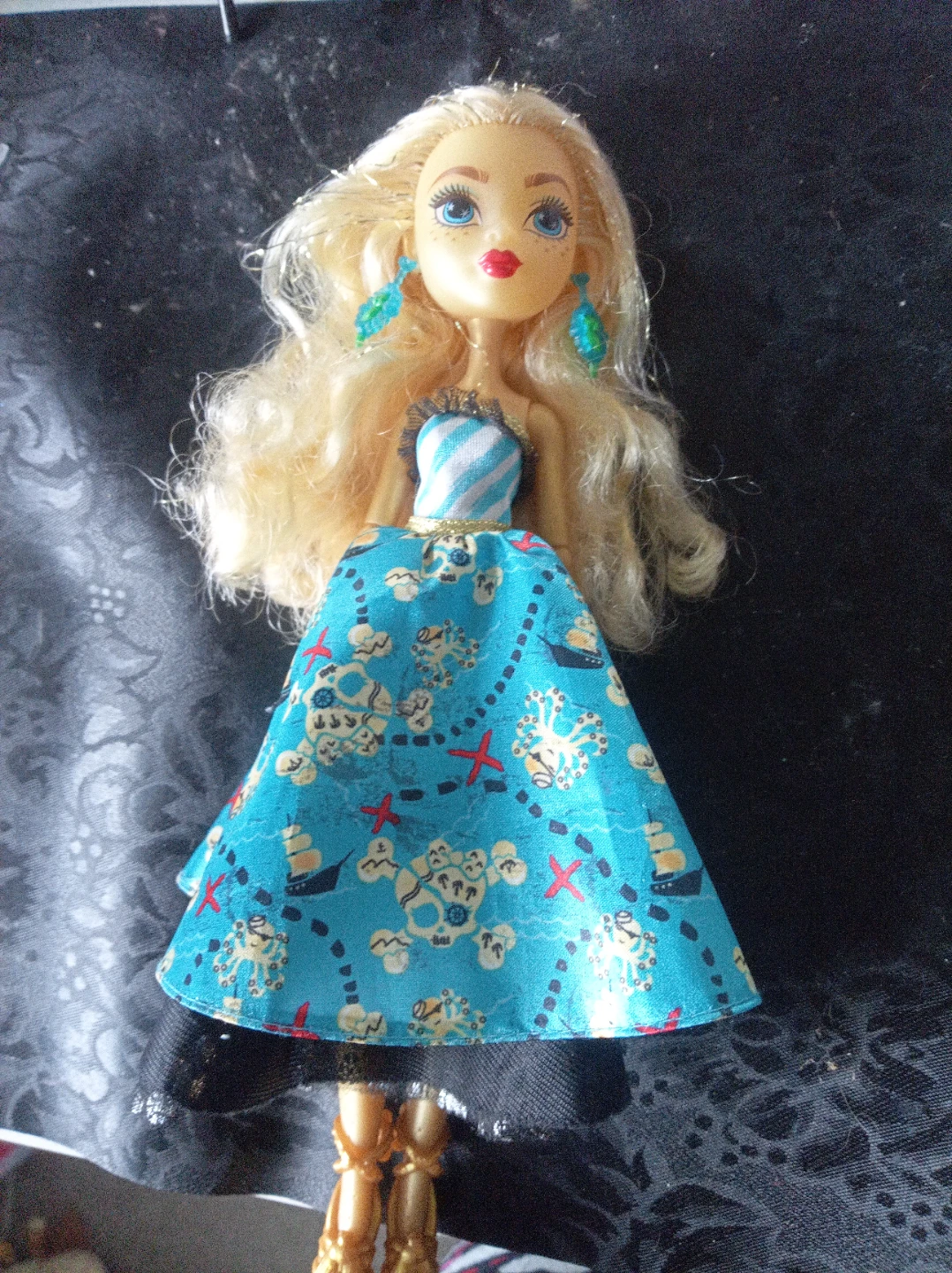 Collection of Stuffed Animals and Doll