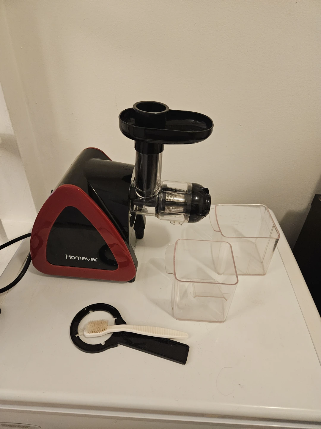 Extracteur de jus Homever noir et rouge