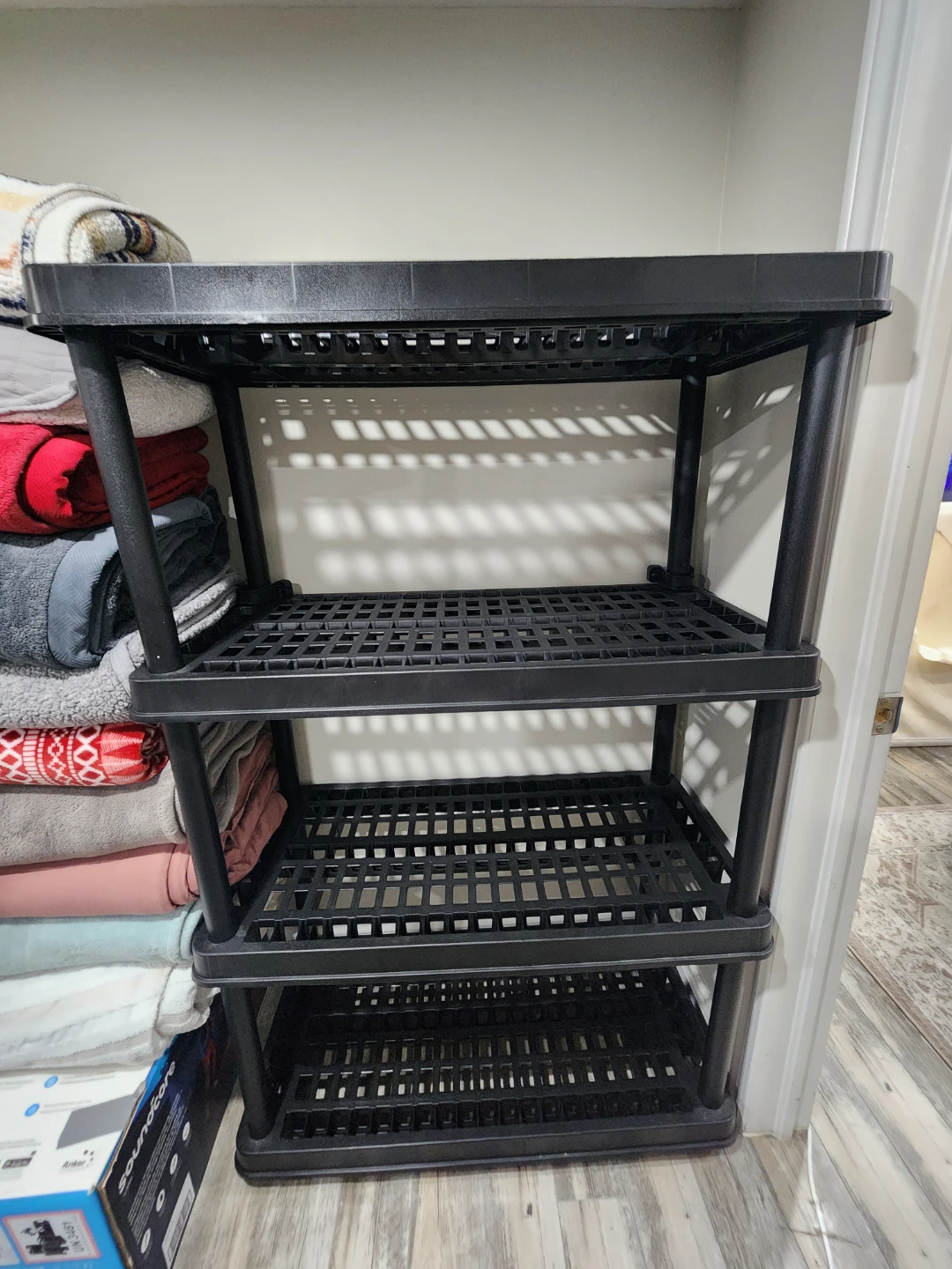 Black 4-Tier Plastic Shelving Unit