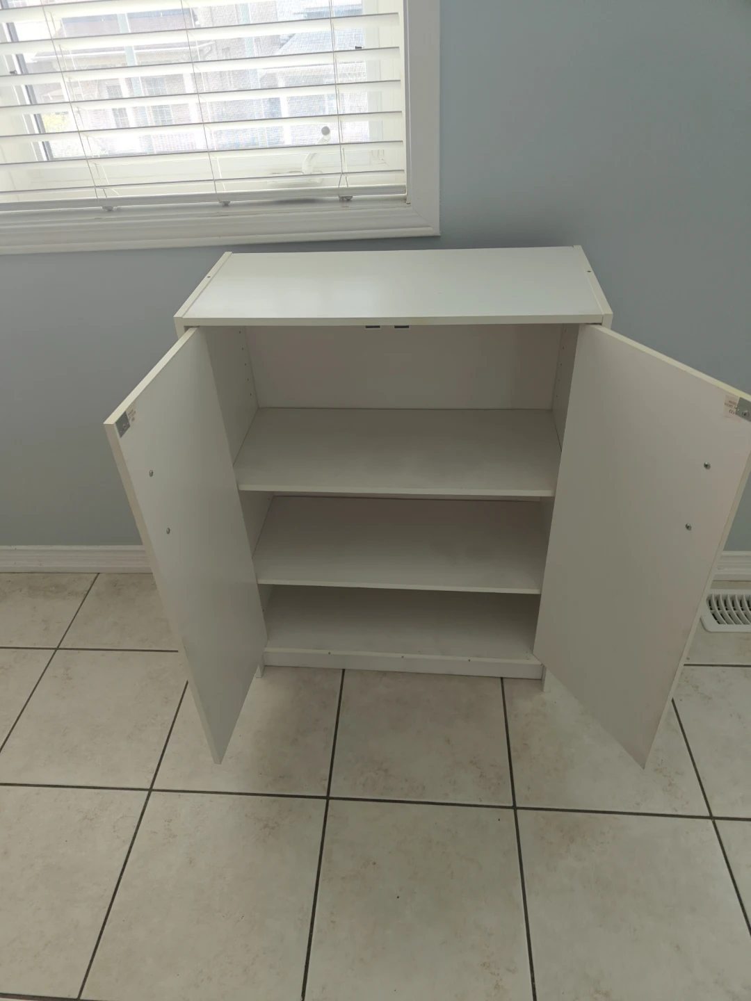 White Two-Door Storage Cabinet - photo 2
