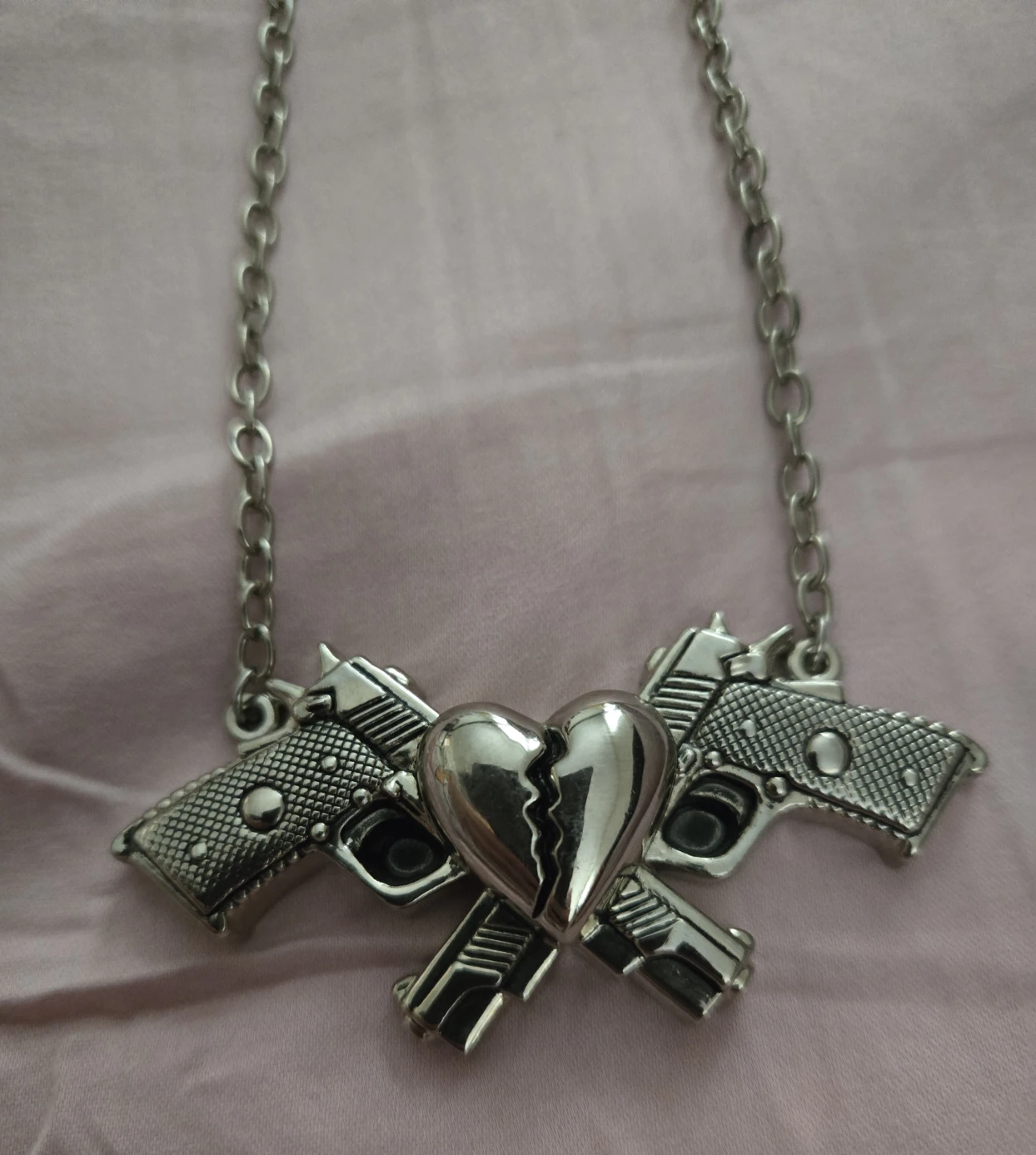 🥕 Rock Rebel Necklace with Guns and Broken Heart Pendant