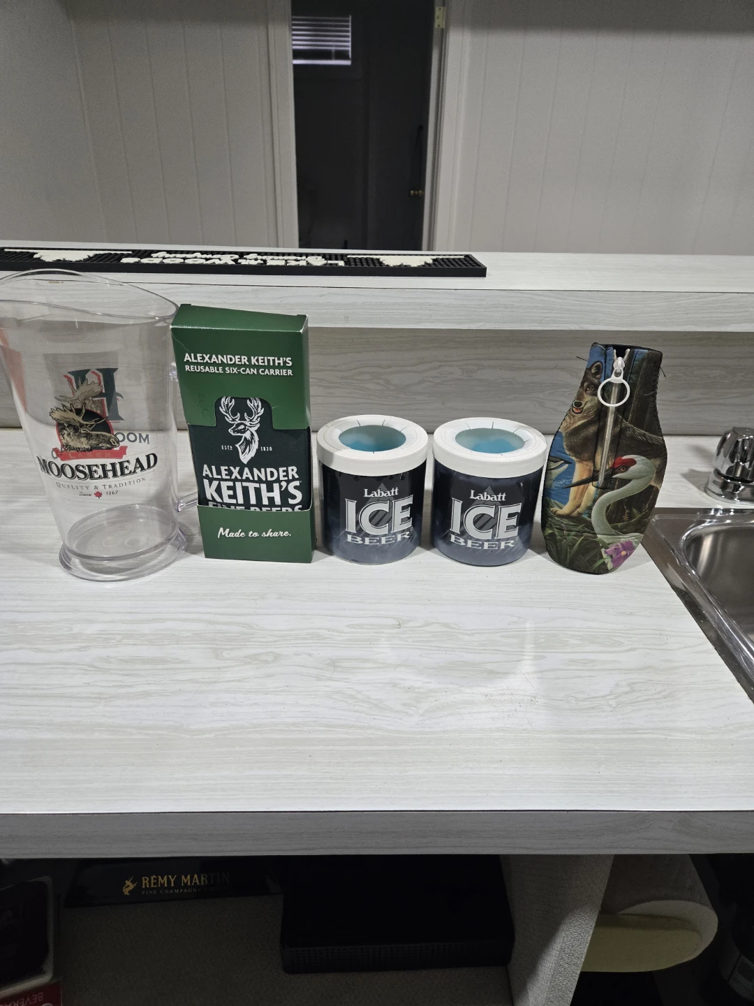 Beer carrier,  three Beer coolies and new pitcher.