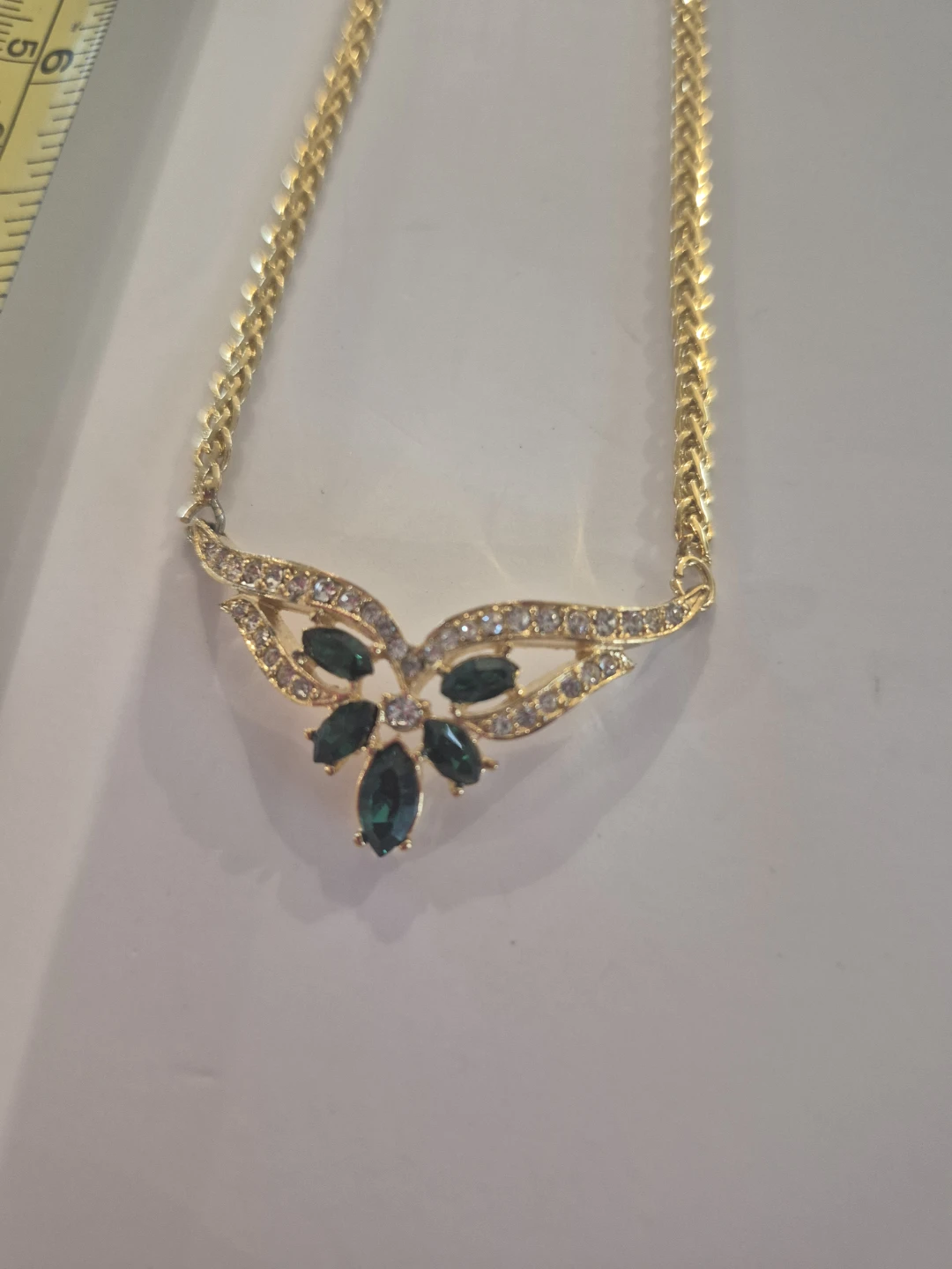 Gold-tone necklace and earrings set with green and clear stones - photo 4