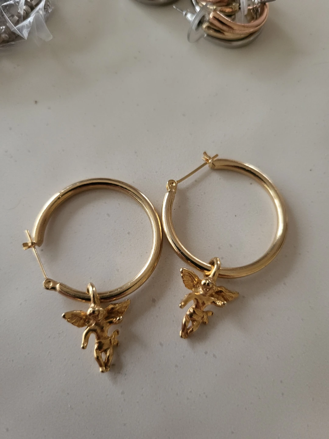 Gold Hoop Earrings with Cherub Charms