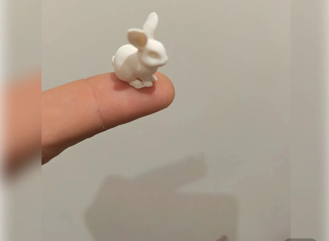 Tiny white bunny figurine