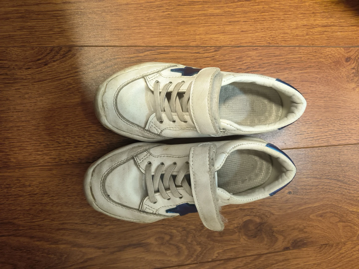 White Sneakers with Blue Star Accent