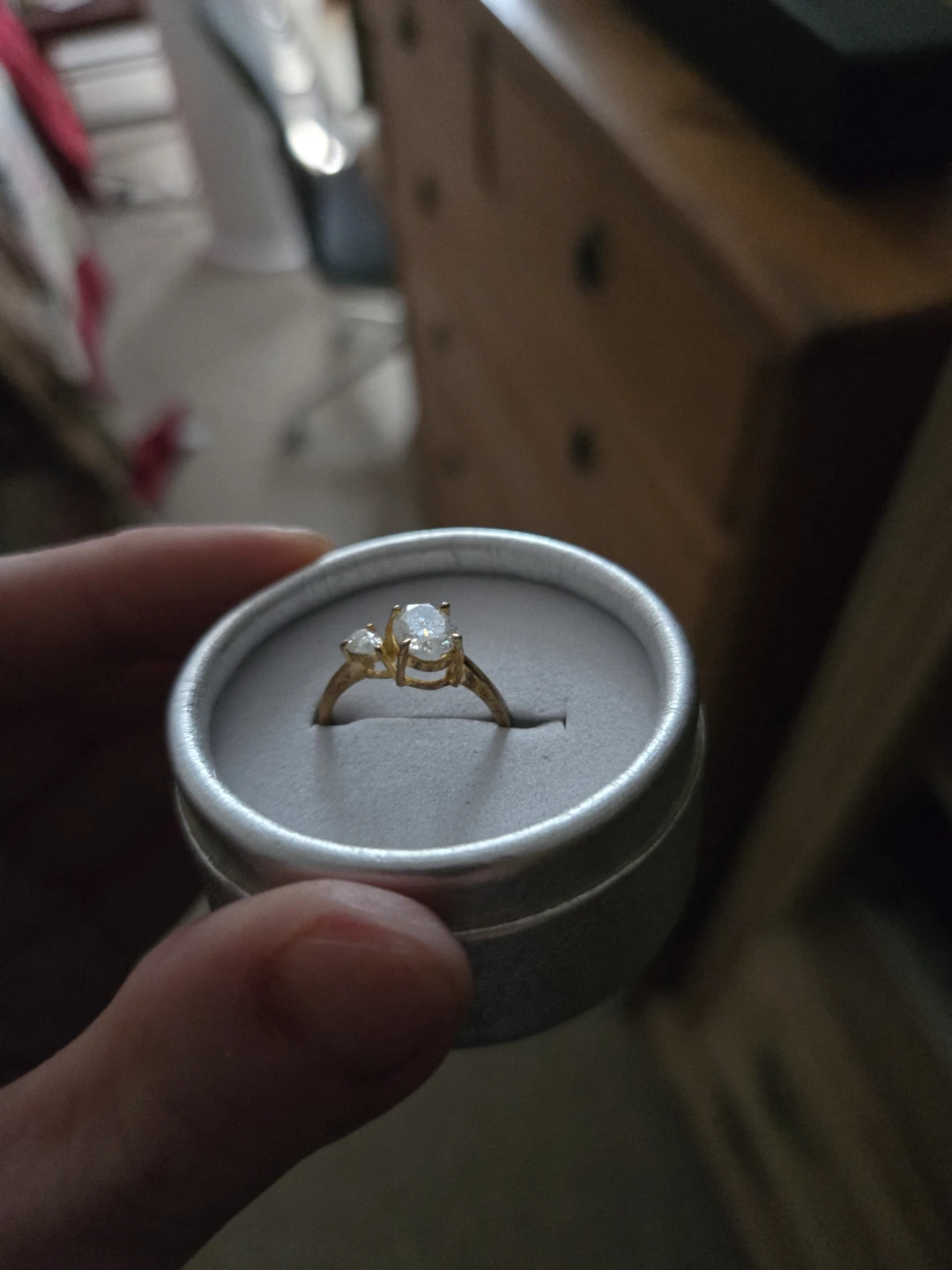 Gold tone ring with two stones