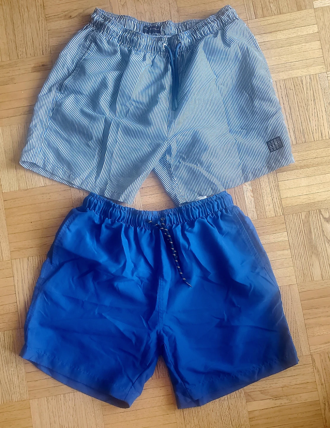 Two Pairs of Men's Swim Trunks