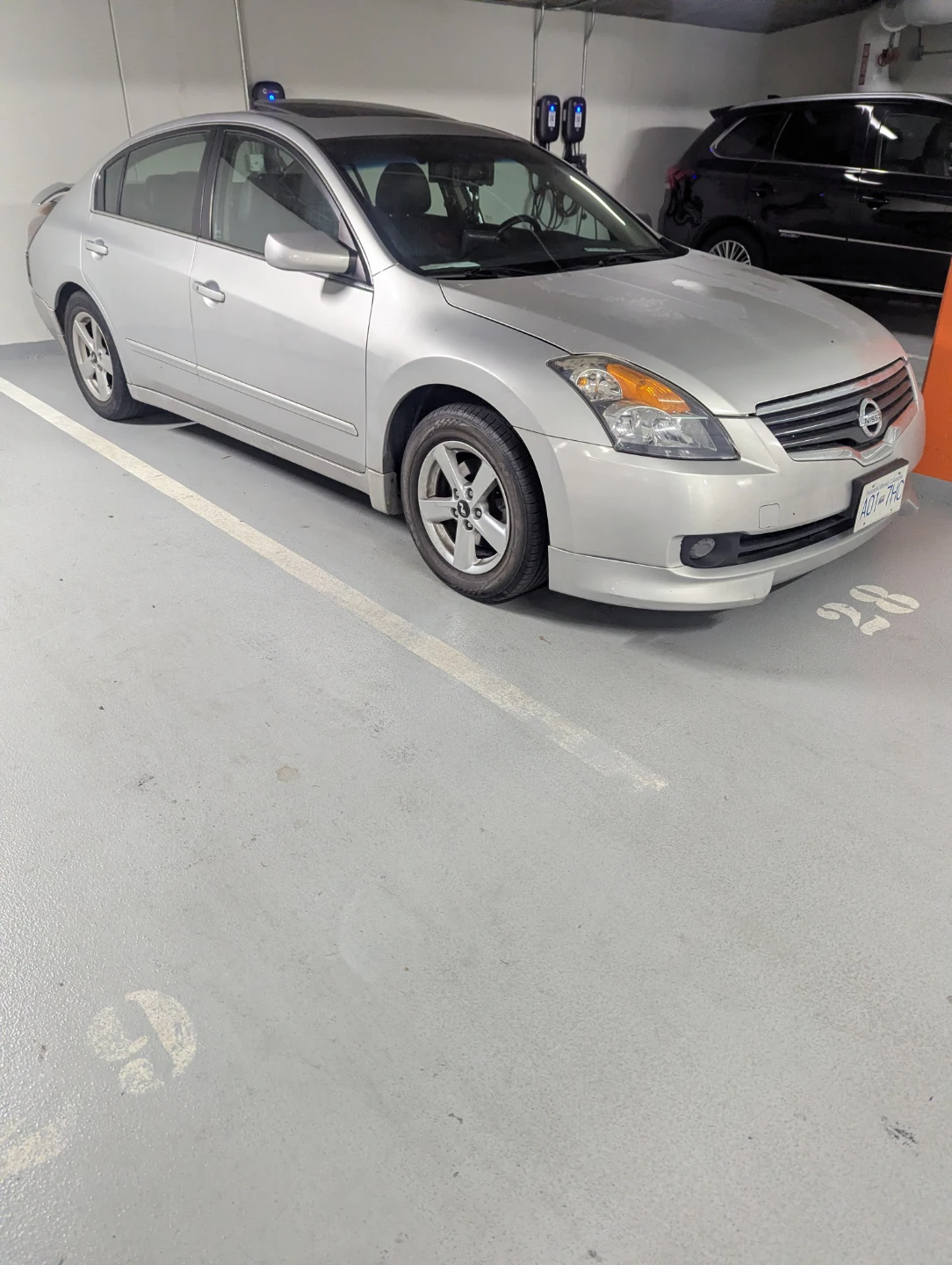Silver Nissan Altima Sedan