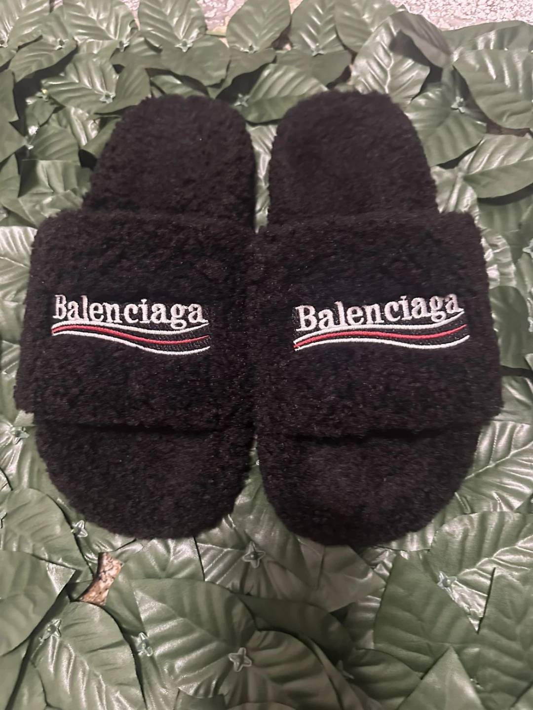 Black Balenciaga fur slides