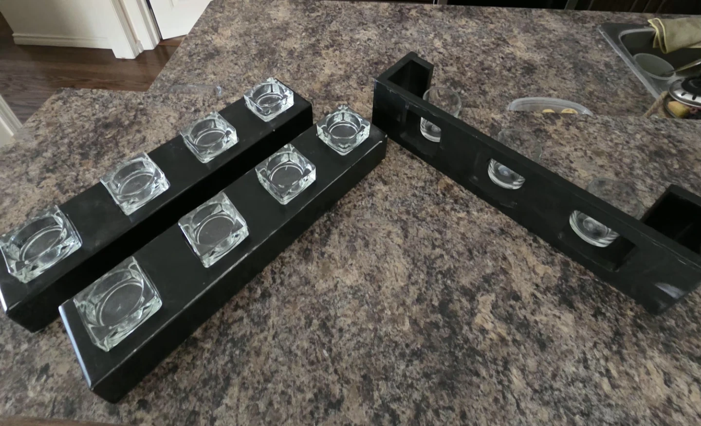 Black multi-candle holder with glass inserts